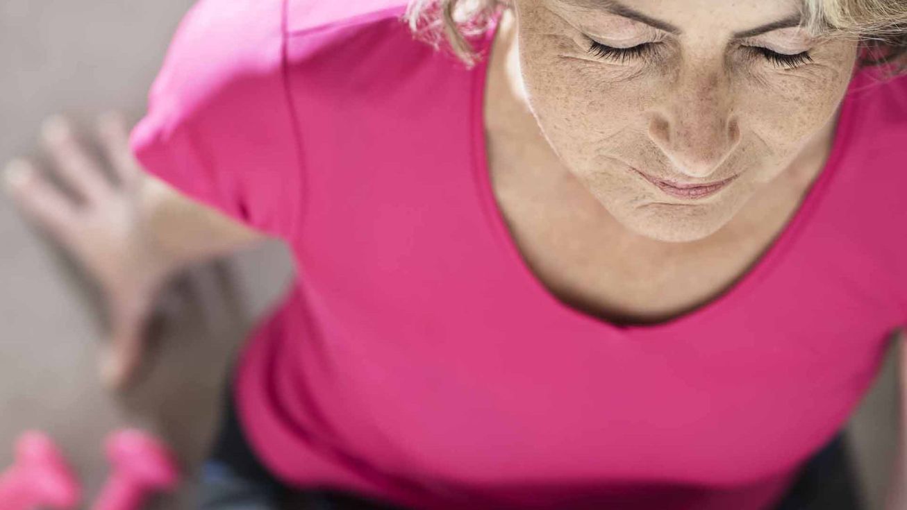 femme qui fait des étirements lors d'un coaching personnalisé